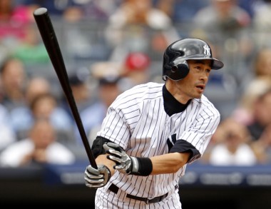 New York Yankees Suzuki watches his solo home run against the Oakland Athletics during their MLB game in New York
